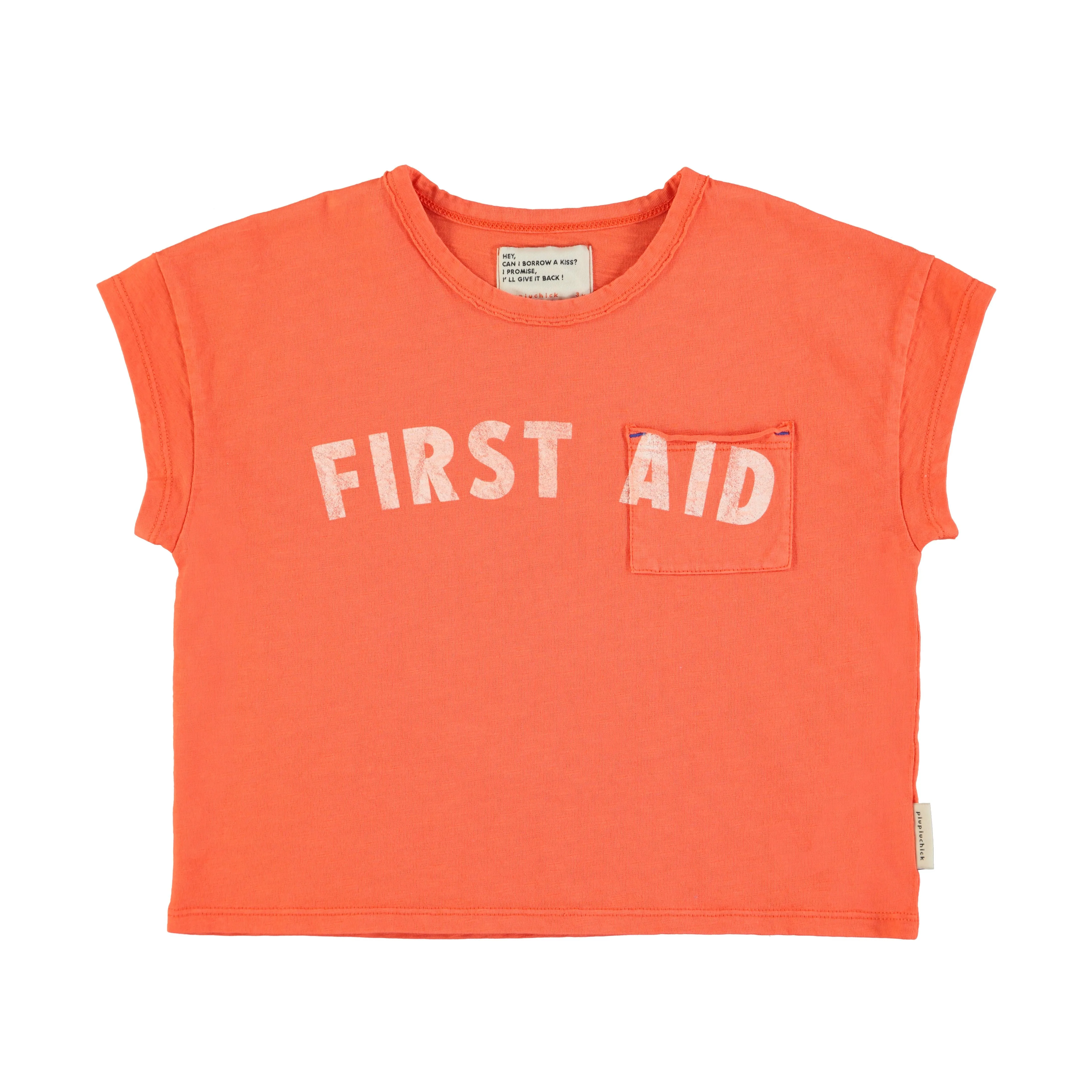 T-Shirt in Orange w/ "First Aid" Print