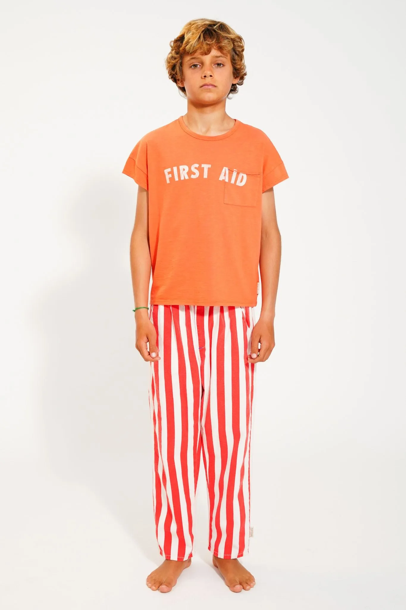 T-Shirt in Orange w/ "First Aid" Print